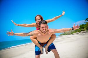 excited honeymoon couple